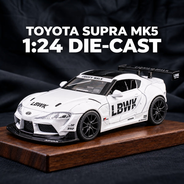 White Toyota Supra MK5 Liberty Walk 1:24 die-cast model car on a wooden display base