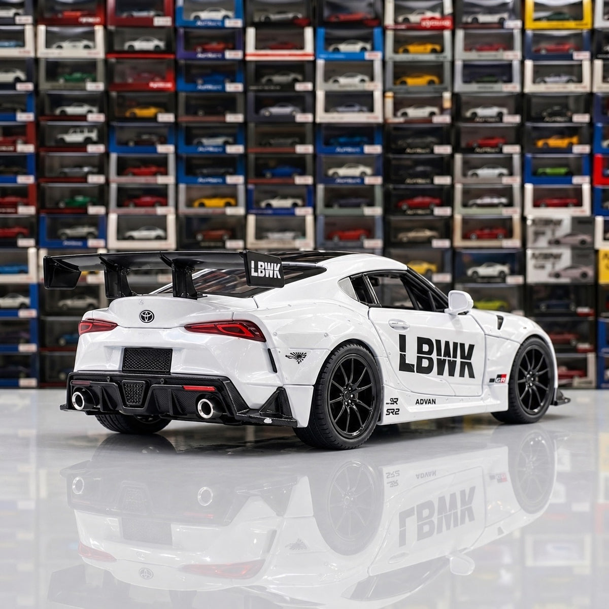 Rear view of the Toyota Supra MK5 Liberty Walk die-cast model showing the oversized rear wing and exhaust
