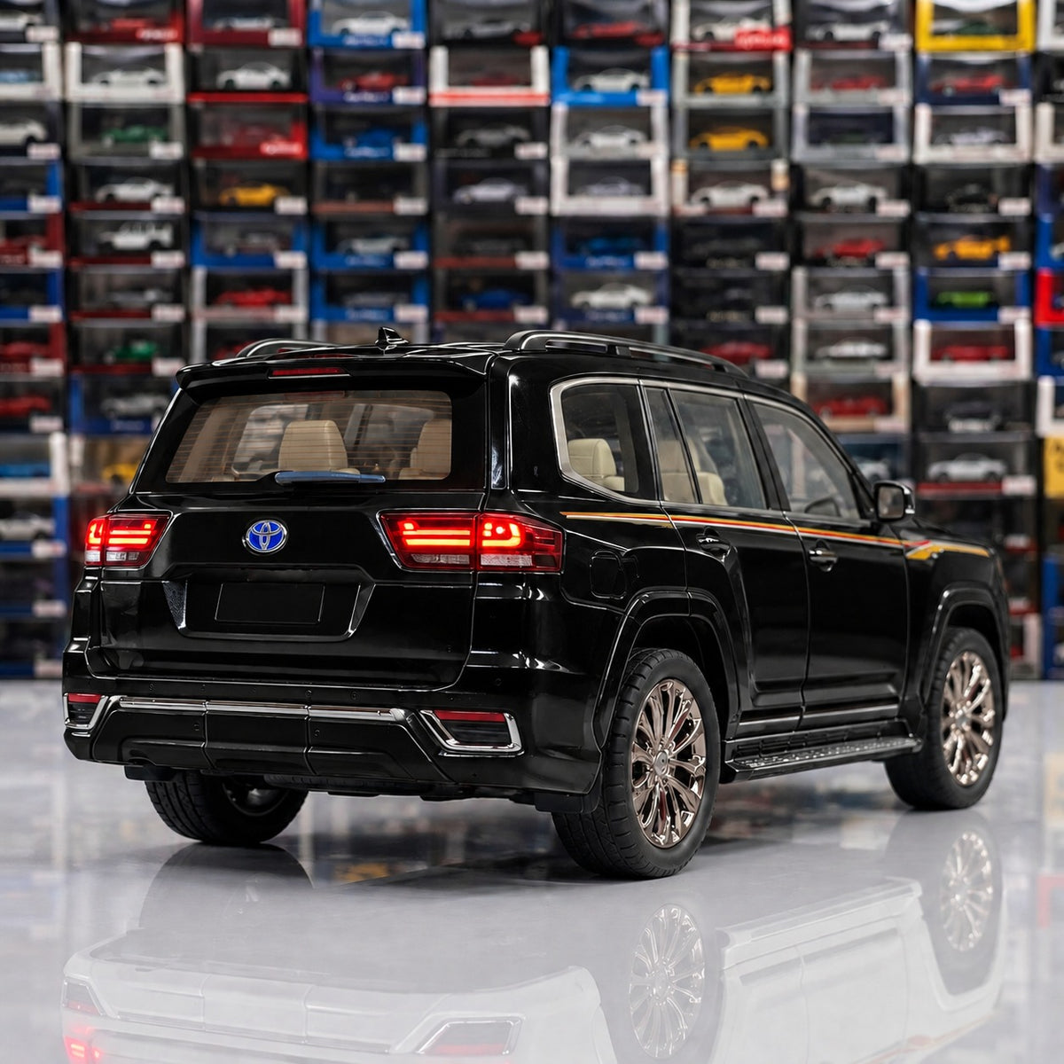 Rear view of the black Toyota Land Cruiser LC300 diecast model with detailed tail lights