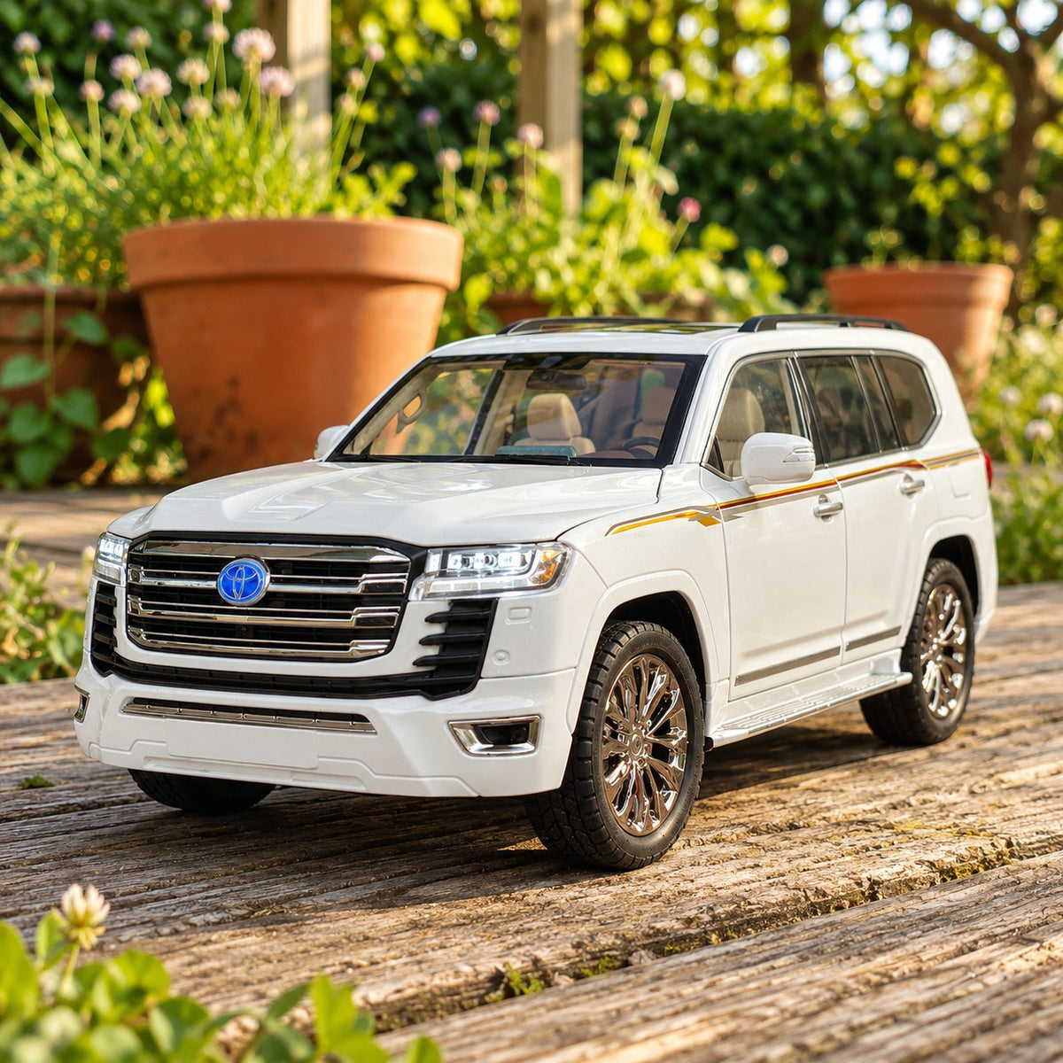 White Toyota Land Cruiser LC300 1:18 die-cast model displayed outdoors
